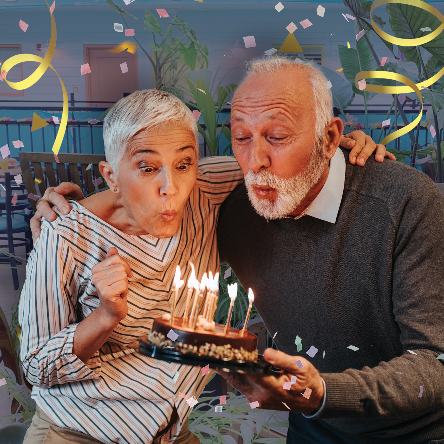 Make your celebration special couple blowing out candles on cake